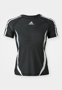 Black Adidas short-sleeve athletic shirt with white stripes on shoulders and silver curved accents on sides.