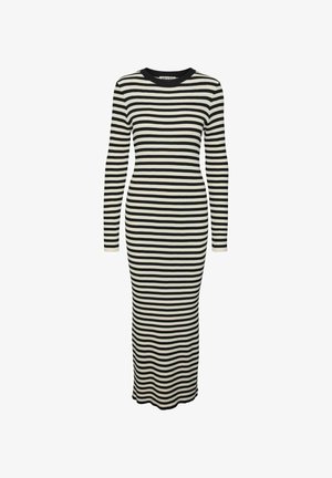 Robe à manches longues rayée en noir et crème, texture côtelée, design ajusté, col rond et silhouette longue jusqu'aux chevilles.