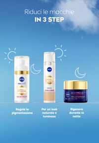 Tre prodotti per la cura della pelle NIVEA per ridurre le macchie scure: un siero trasparente, una crema CC beige con SPF30 e una crema notte blu con dettagli dorati.