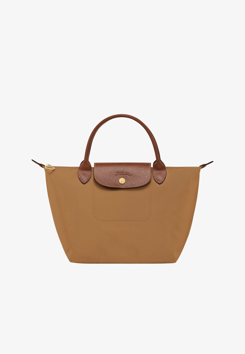 Brown nylon tote bag with a textured leather flap, two rounded handles, and a gold-tone zipper detail. Features a front pocket.