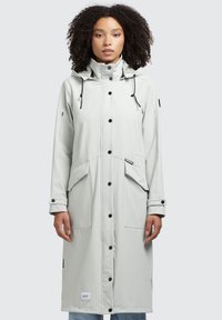 Light gray waterproof raincoat with a hood, black buttons, two large front pockets, and an adjustable drawstring at the neckline.