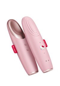 Dispositif en silicone rose avec un intérieur métallique brillant. Présente un design Hello Kitty, des boutons de contrôle et une forme lisse et arrondie.