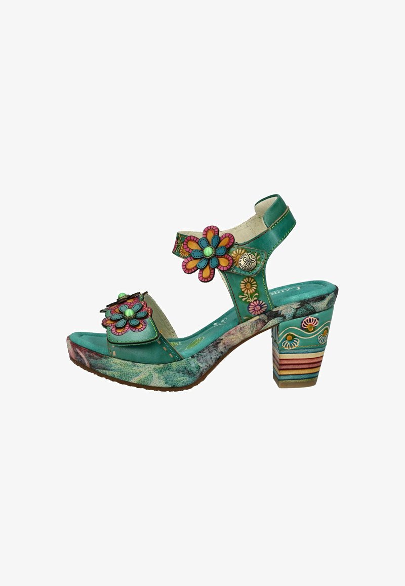 Turquoise platform sandal with floral embellishments, patterned heel, and decorative stitching; adjustable straps and textured surface.