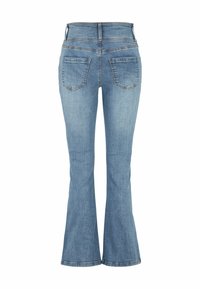 Vaaleansiniset farkut, joissa on leveät lahkeet ja korkea vyötärö. Farkuissa on kaksi takataskua ja näkyvää ompelua saumoissa.