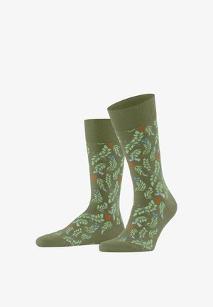Zielone skarpetki za kostkę z kolorowym botanicznym wzorem liści oraz drobnymi czerwonymi, niebieskimi i beżowymi jagodami rozsianymi po całej powierzchni.