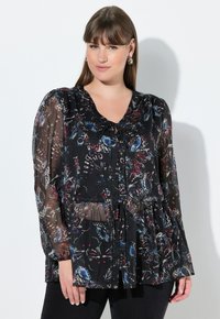 Černá halenka s výstřihem do V, dlouhými průsvitnými rukávy a zavazovacím detailem vpředu. Obsahuje barevné vzory motýlů a květin.