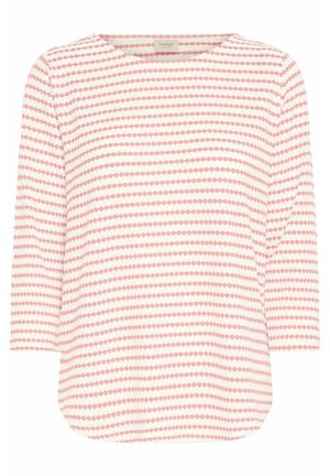 Long-sleeve top in lightweight fabric with a rounded neckline, featuring alternating pink and white dot patterns on a cream background.