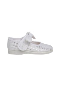 White perforated shoe with a round toe, flat sole, and a soft bow strap detail. Made of flexible material for comfort and breathability.