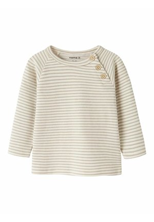 Langærmet babytrøje med cremefarvede og beige striber, tre træknapper på venstre skulder og rund halsudskæring.