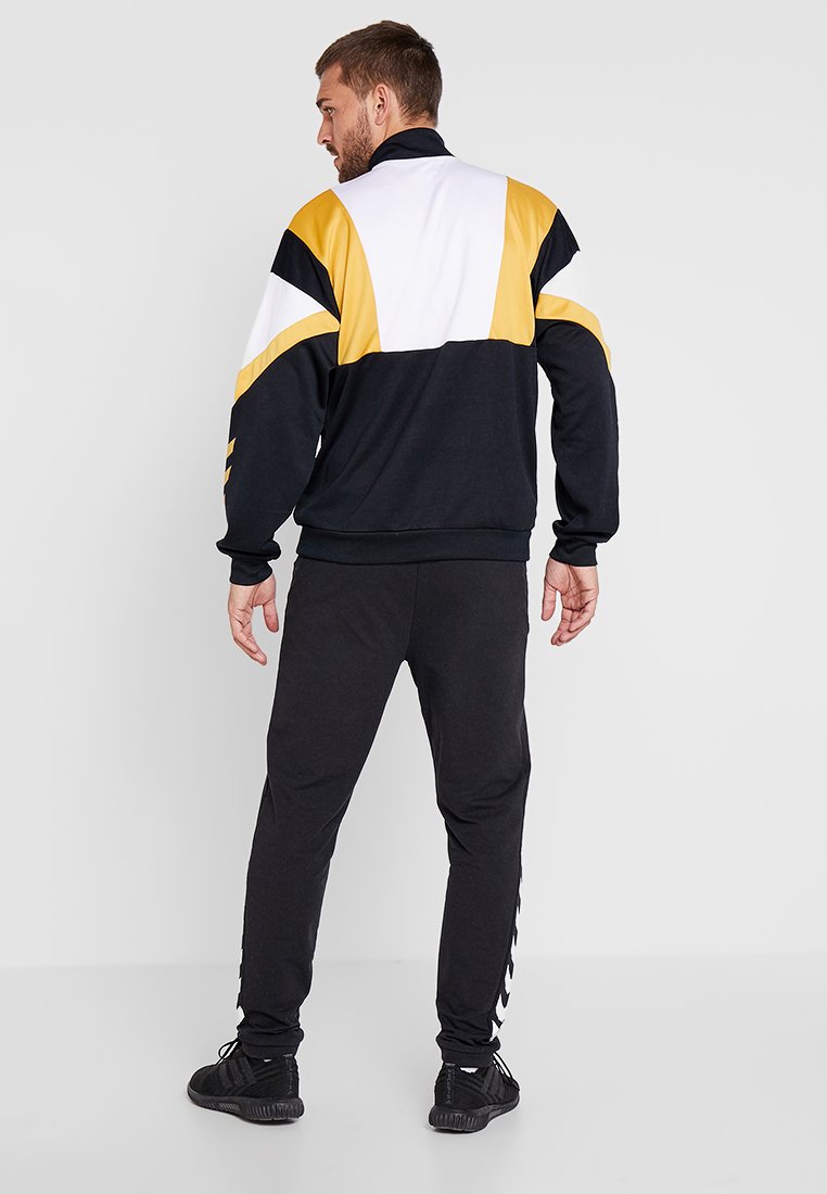 Hummel RAY Joggebukse blacksvart Zalando.no Hummel RAY Joggebukse blacksvart Zalando.no