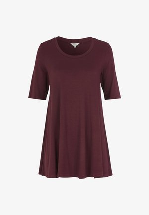 Tunique bordeaux à manches courtes avec col rond et coupe évasée, présentée sur un fond blanc uni.