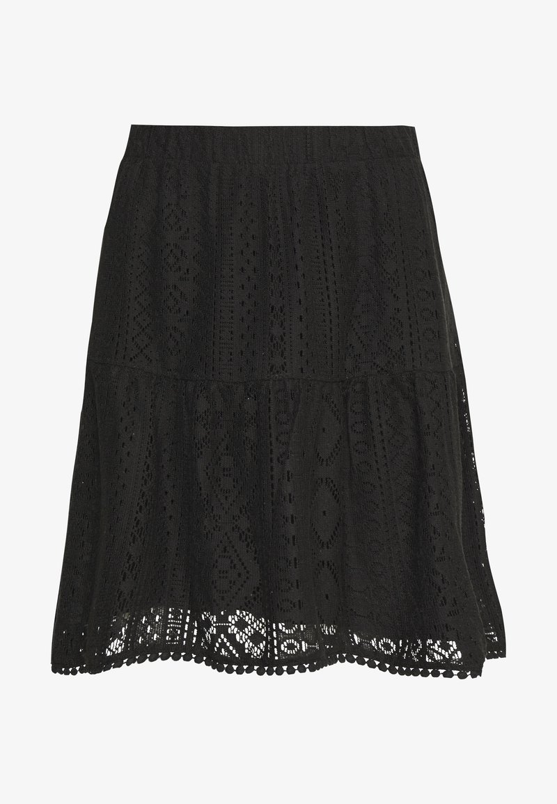 Jupe noire longueur genou avec des motifs en dentelle complexes et un ourlet festonné.