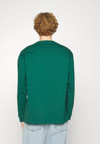 Carhartt WIP CHASE - Hosszú ujjú felső - chervil/gold