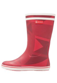 Botte de pluie en caoutchouc rouge avec un motif géométrique, accents blancs sur le haut et la semelle, surface texturée, et logo Aigle sur le côté.