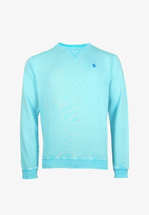 Sudadera azul claro con cuello redondo, mangas largas y un pequeño logo bordado en el pecho. Textura suave, ajuste casual.