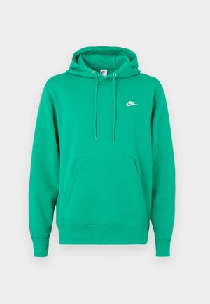 Žalias Nike džemperis su priekyje kišene, su raišteliais reguliuojama kapuce ir mažas baltas logotipas kairėje krūtinės pusėje. Minkšta medžiaga, standartinė danga.