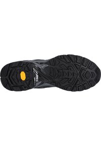 Svart träningsskosula med ett robust, multidirektionellt mönster och en tydlig gul Vibram-logotyp för grepp och hållbarhet.