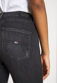 Tommy Jeans Jeans Skinny Fit - black denim