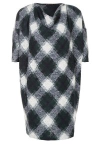 Robe ample à manches courtes avec un grand motif à carreaux noir, blanc et gris et un col drapé.