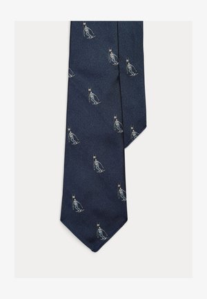 Gravata em seda azul-marinho com padrão espinha de peixe e ilustrações repetidas de esquiadores em branco e azul claro, com design de ponta pontiaguda.