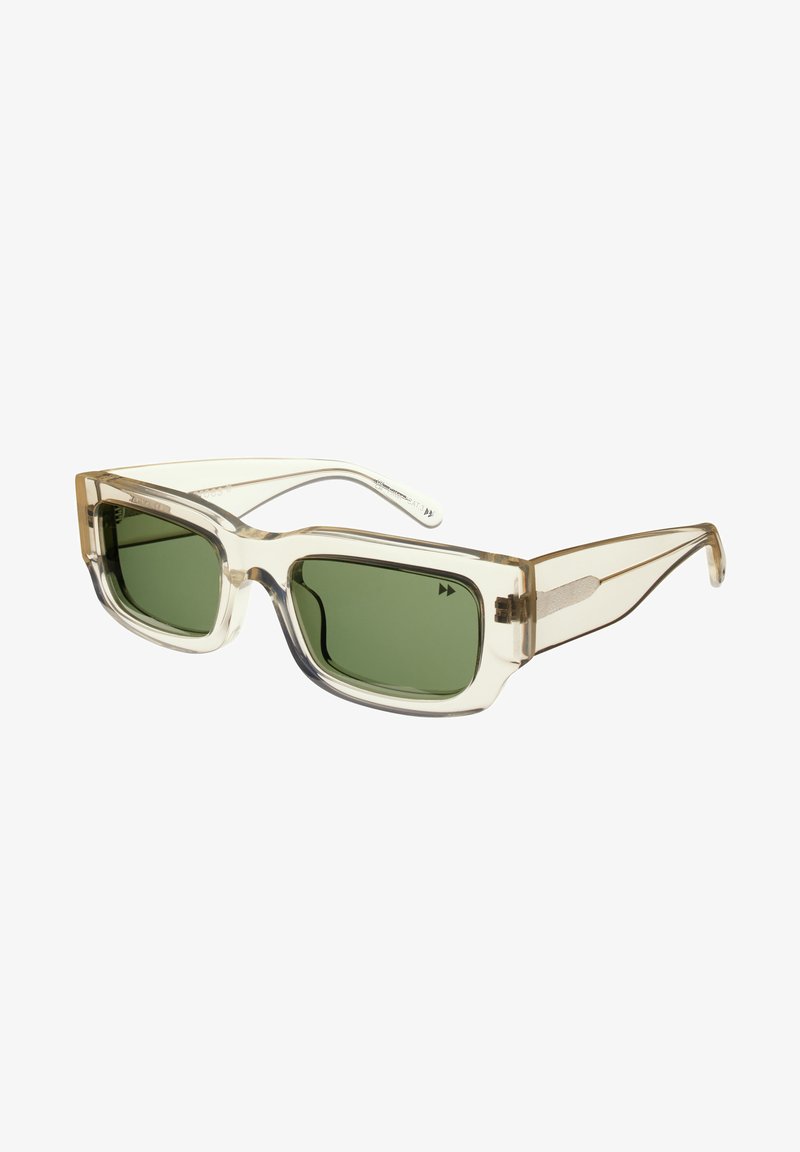 Transparante rechthoekige zonnebril met groene lenzen, met een oversized ontwerp en subtiele beige accenten op het montuur.