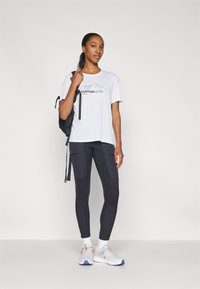 Peak Performance EXPLORE GRAPHIC TEE - T-Shirt print - white