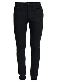 Svarta denim skinny jeans med en slät textur, klassisk femficksdesign och subtila sömmar. Har dragkedja och knappknäppning.