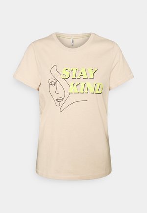 Beige cotton t-shirt with short sleeves, featuring a black line drawing of a face and green "STAY KIND" text. Classic crew neck design.