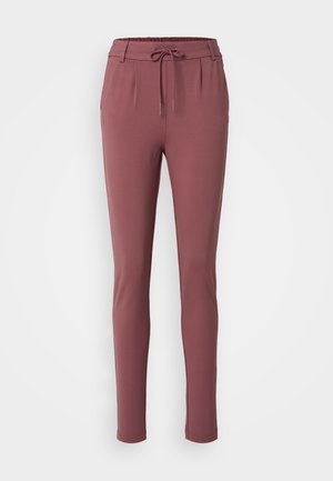 Pantalons de jogging bordeaux avec une taille élastique, un cordon de serrage et des poches latérales. Fabriqués en tissu doux et extensible avec un design de jambe fuselée.