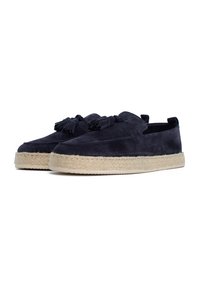 Granatowe zamszowe slip-on z frędzlami i podeszwami z juty. Posiada płaskie, zaokrąglone palce i minimalistyczny design.