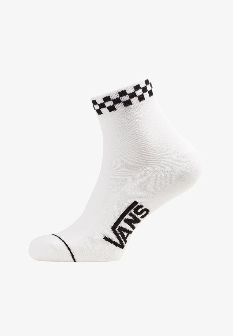 Le calze bianche alla caviglia presentano un motivo a scacchi neri nella parte superiore e il logo "VANS" nero sul lato. Realizzate in un materiale morbido ed elastico.