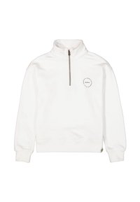 Sudadera blanca con cremallera y collar alto, hecha de material suave. Presenta un pequeño logotipo en la parte frontal y puños acanalados.