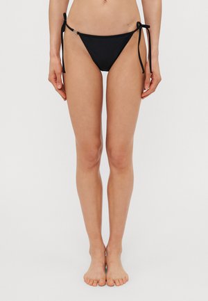 Black bikini bottom with tie-side design, featuring a sleek, smooth texture and minimal coverage. Accented with a small metallic detail.