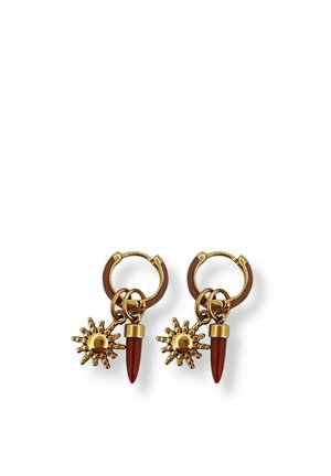 Gold hoop earrings with sunburst charms and brown elongated spike pendants dangling from each hoop.