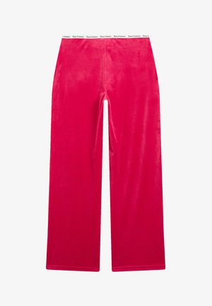Pantaloni a gamba larga in corduroy fucsia con texture liscia e una cintura elastica con logo bianco. Design a taglio dritto e lunghezza completa.