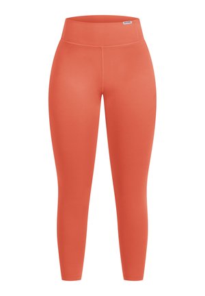 Orange leggings with a high waistband, smooth texture, and fitted shape. Features a seamless design and a small logo tag near the waistband.