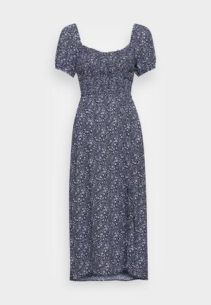 Abito midi blu navy a fiori con busto aderente, maniche a sbuffo e dettagli smock. Presenta piccoli motivi floreali bianchi su tutto l'abito.