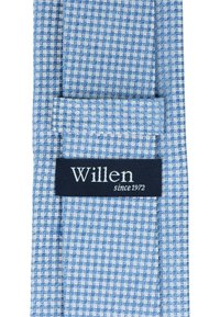 Checked tie in light blue and white, featuring a woven texture and logo tag in navy with "Willen since 1972" in white lettering.