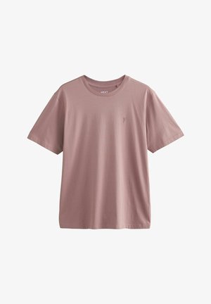 Lys pink kortærmet t-shirt lavet af blød bomuld. Har rund halsudskæring og et lille broderet logo på venstre bryst.
