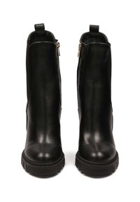 Black leather ankle boots with a smooth finish, featuring side zippers, a round toe, and a textured black sole. Accented with gold hardware.