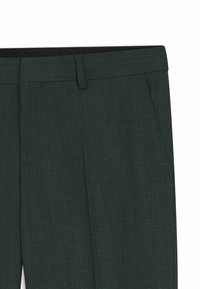 Donkergroene, op maat gemaakte broek van textuurrijk stof, voorzien van zijzakken en een platte voorkant. Minimalistische tailleband voor een strakke uitstraling.