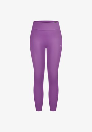 Lilla leggings med høj talje, lavet af et glat, elastisk stof. Har en lille logoaccent på den nederste del af benet.