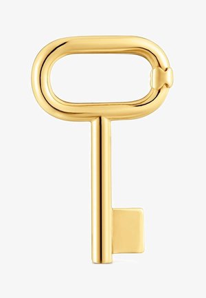 Clé dorée brillante avec un panneton ovale et une partie rectangulaire sur fond blanc.