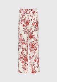 Pantalons larges blancs avec des motifs floraux rouges et roses, en tissu léger, dotés d'une taille plate avec une fermeture à bouton.