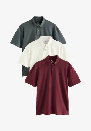 Kollektsioon kolme polo särki tumesinises, valges ja burgundi värvitoonis. Lühikeste varrukatega, nööbiplokiga ja väikese logoga rinnal.