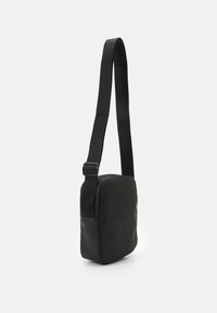 Borsa A Tracolla Unisex Travelon Essentials – Leggera, Antirapina Con Sicurezza A 5 Punti, In Nylon, Per Viaggi E Uso Quotidiano