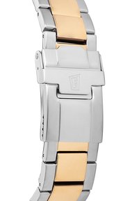 Bracelet de montre en métal argenté et doré avec maillons entrelacés, présentant une finition brossée et des accents brillants sur les maillons dorés. Design de fermoir visible.