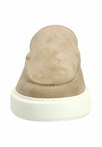 Beige suede slip-on shoe with rounded toe, white rubber sole, and visible stitching detailing on the upper. Minimalistic design, no hardware.