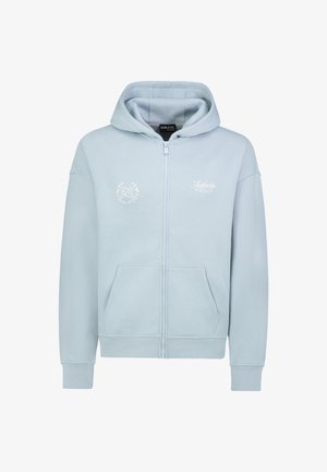 Hellblauer Kapuzenpullover mit Reißverschluss aus weichem Stoff. Verfügt über eine Fronttasche, gerippte Bündchen und ein auf der Brust gesticktes Logo.