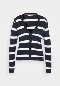 Cardigan a righe blu navy e bianche realizzato in materiale lavorato a maglia. Presenta un collo a V, maniche lunghe, chiusura frontale con bottoni e un piccolo dettaglio con logo.
